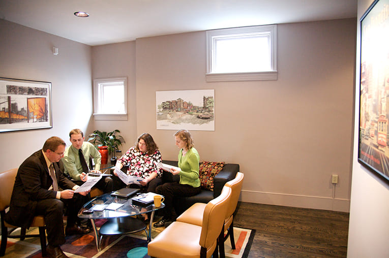 Business people having a brief meeting around a table