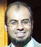 A headshot of Ayman Nassar