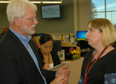 Two business people have a face-to-face discussion